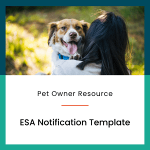 Woman holding dog and dog is facing audience